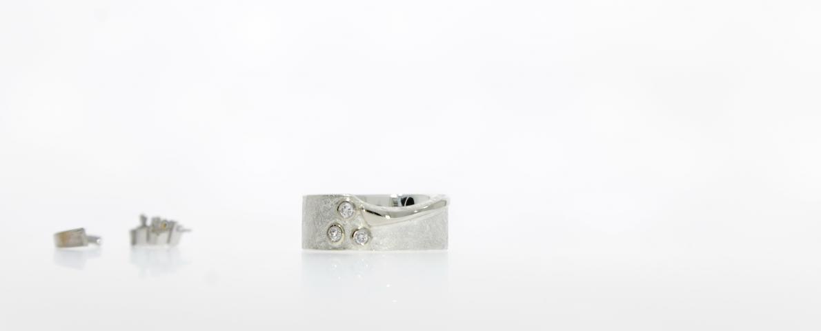 Brillanten aus alten "Krappenfassungen" in einem neuen Ring Brillantring
