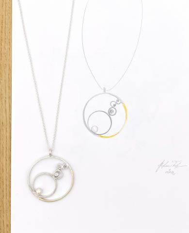 Anhänger aus Silber mit Gelbgold Sonnenlicht